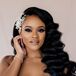 Bride With Loose Curls Hairstyle and Embellished Hair Comb