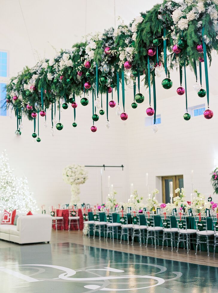 Hanging Floral Arrangement Over Dance Floor With Greenery and Ornaments