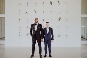 Couple Wearing a Black Tuxedo and Navy Tuxedo at Wedding at The Prospect House in Dallas, Texas