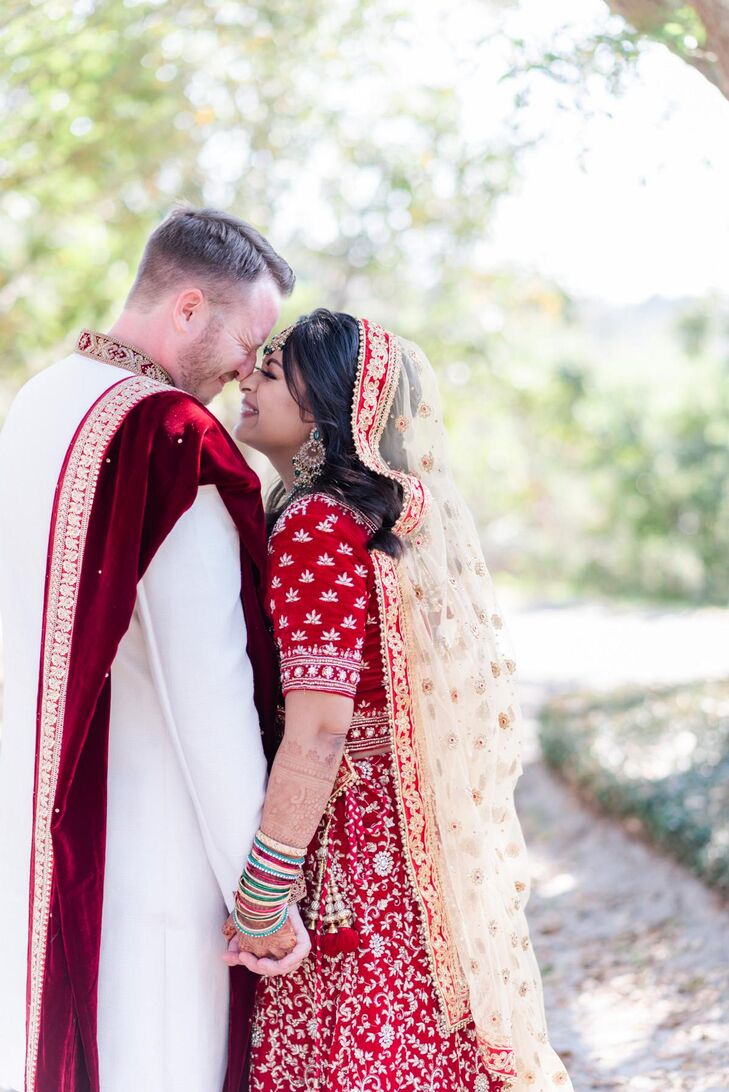 Groom in Sherwani and Bride in Sari Sharing Embrace