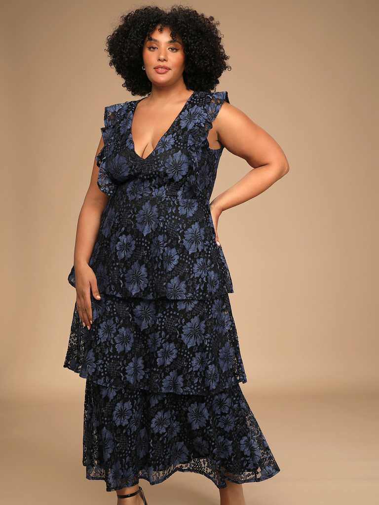 A model shows off this V-neck, ankle-length floral gown.