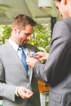 Groomsman Fastens Boutonniere
