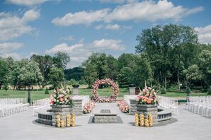 Summer Garden Ceremony With Bright Flowers, Lemons and Circle Arch