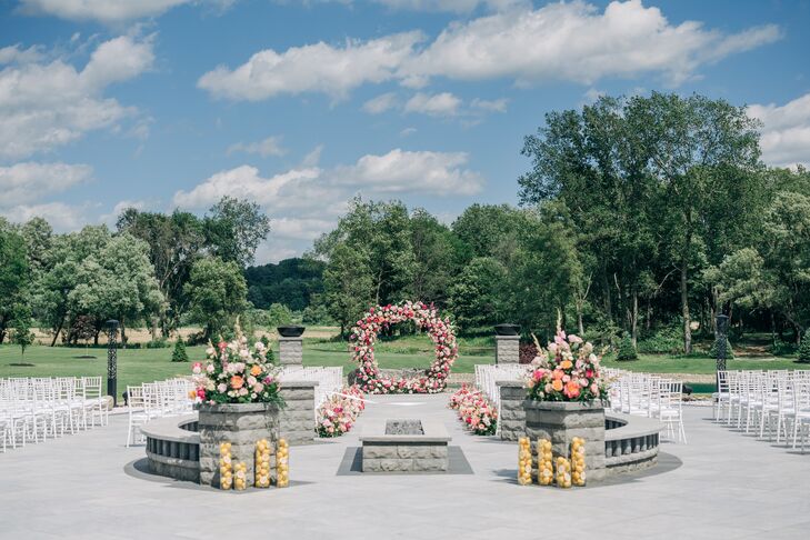 Summer Garden Ceremony With Bright Flowers, Lemons and Circle Arch