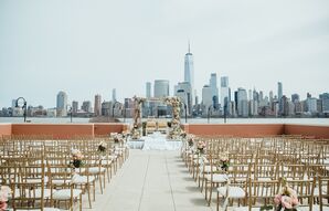 Elegant Riverfront Ceremony with Manhattan Skyline Backdrop