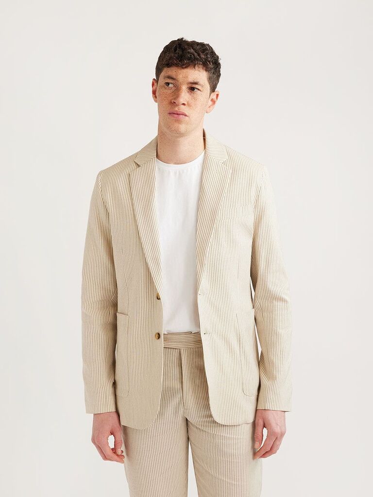 Striped earth-tone blazer, men's fashion trends 2023. 