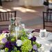 "The flowers came out stunning," Valerie says. "They were Tuscan-inspired with white hydrangeas, purple roses, olive leaves and other green and purple accents."