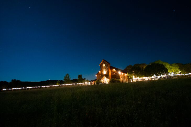 Following the outdoor ceremony, the barn at Old Glory Ranch in Wimberley, Texas, was a beautiful private space for Sarah and Bruce's 150 guests to dance the night away.