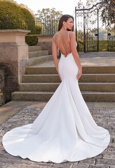 bride in spaghetti strap A-line wedding dress with groom