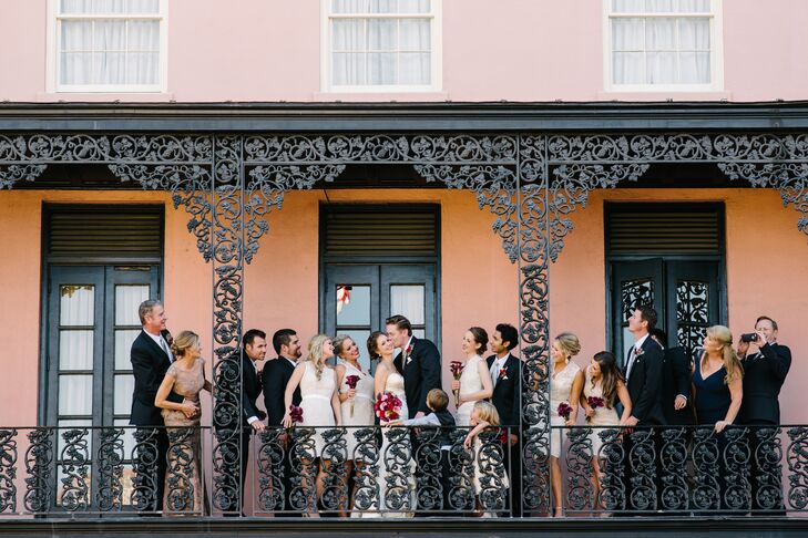 Jaclyn opted for neutral lace bridesmaid dresses because she didn't want her color palette to be restricted to whatever tone she settled on for their dresses. Instead, she added a pop of color through their burgundy bouquets.