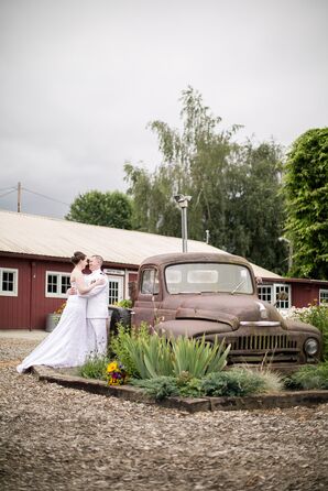 Married Couple Near Old Rustic Truck