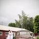 Married Couple Near Old Rustic Truck