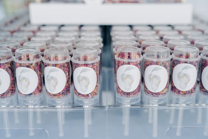 Dried Petals in Small Containers With Couple's Logo for Summer Wedding