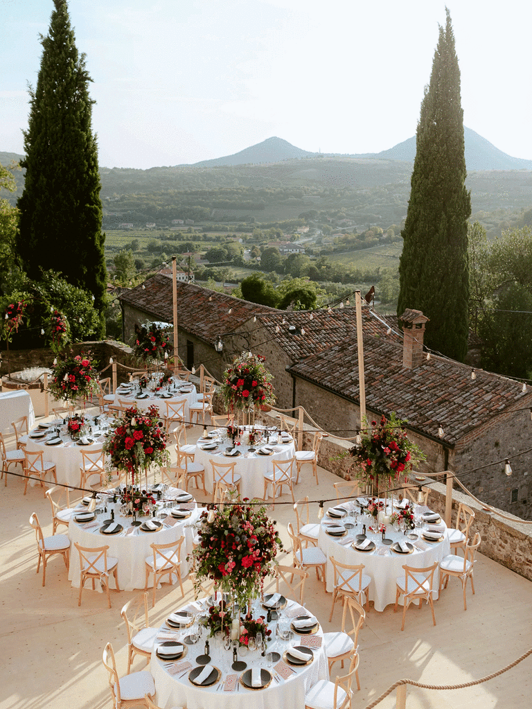 Outdoor wedding reception on a patio in Italy.