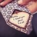 Shira sewed a personal message on the back of her father's tie.