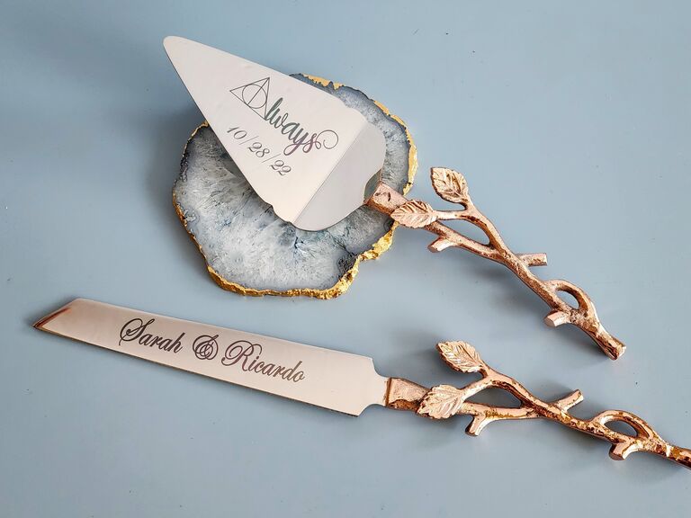 Rustic custom-engraved cake cutting set. 