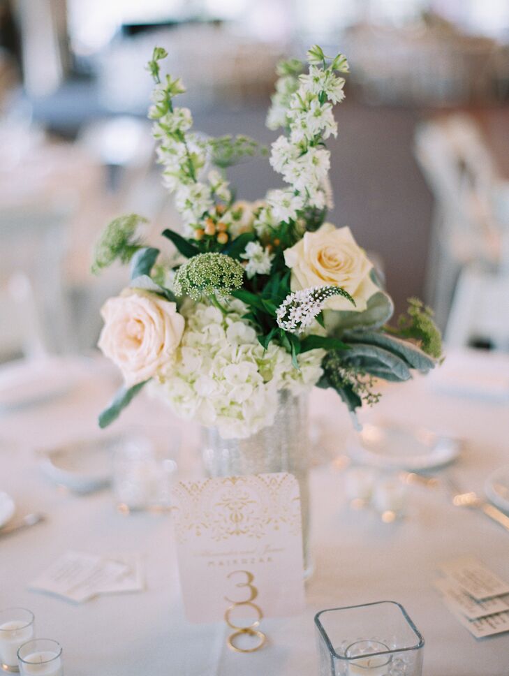 “I told my florist ‘garden-inspired, romantic and whimsical,’ and she went crazy!” says Jamie. “I loved every single arrangement because it was exactly what I'd envisioned. Peggy listened to my dream and made it a reality.”