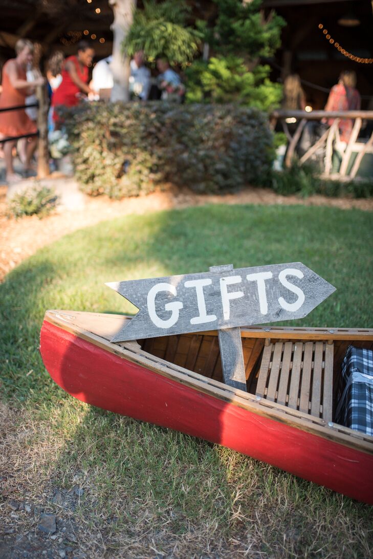 In lieu of  a gift table, presents were loaded up into a canoe for Morgan and Park.