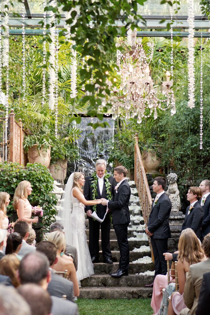 Since the ceremony and reception took place at Haiku Mill (an old sugar mill in Haiku, HI), the couple was surrounded with lush island greenery, waterfalls and their own elegant touches during their marriage vows.