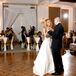 To convey a more glamorous feel, Chloe wore a different dress to the reception. It was an A-line Justin Alexander with a hand-beaded bodice, sweetheart neckline and intricate crystal beading down the train.