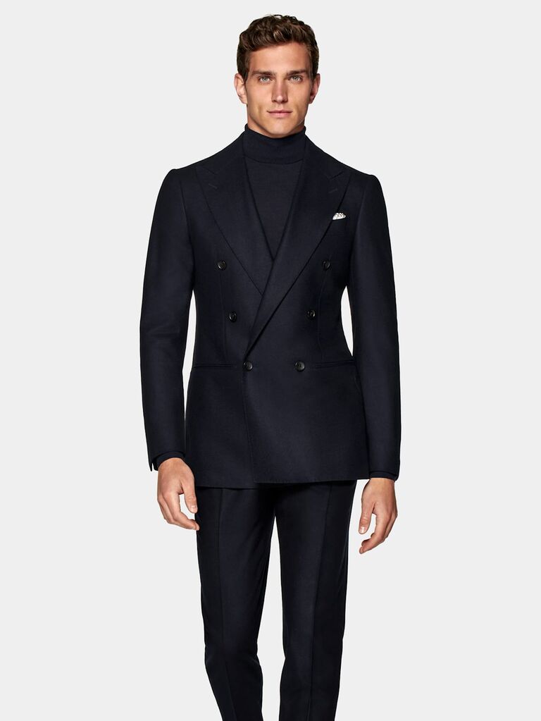 Double-breasted navy suit, men's suit trends 2023. 