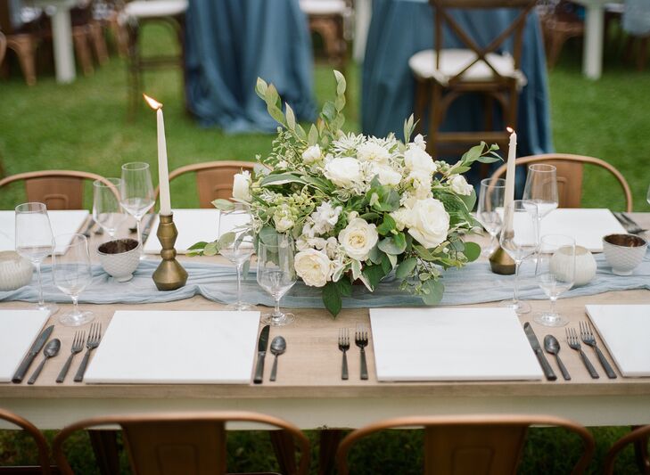 Chic White and Green Centerpiece on Light Blue Table Runner