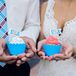 In addition to having two cakes, Samantha and Chris took their patriotic theme one step further with red, white and blue cupcakes adorned with "USA" toppers.