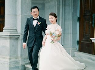 To celebrate their marriage, Yi and Song planned a classic summer wedding at the historic <a href="https://www.theknot.com/marketplace/boston-public-l