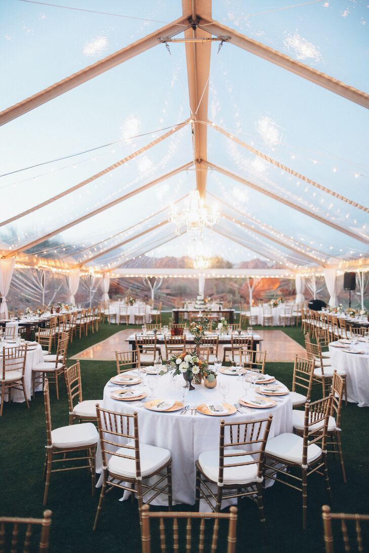 Chandeliers and twinkle lights add a touch of glamour to the tent.