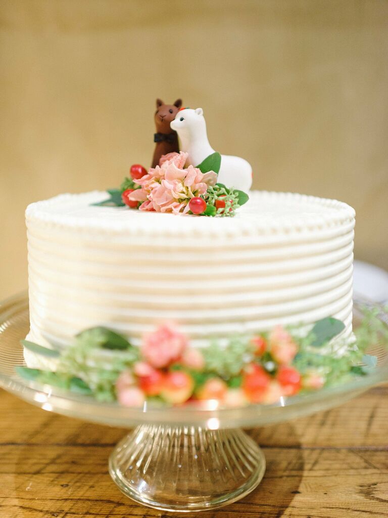Brown and white llama cake toppers. 