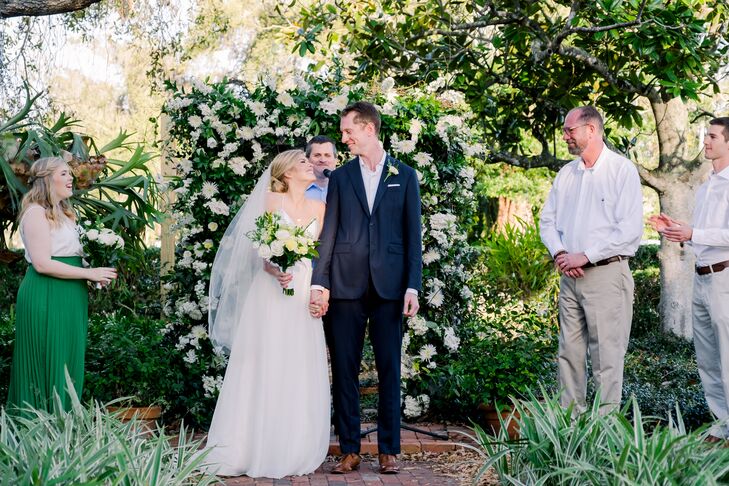 Casual Backyard Ceremony with Flower Arch