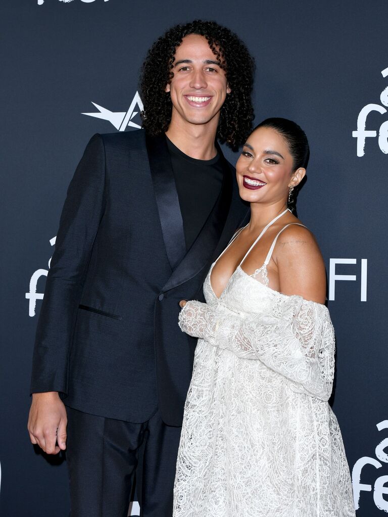 Vanessa and Cole pose on the red carpet. 