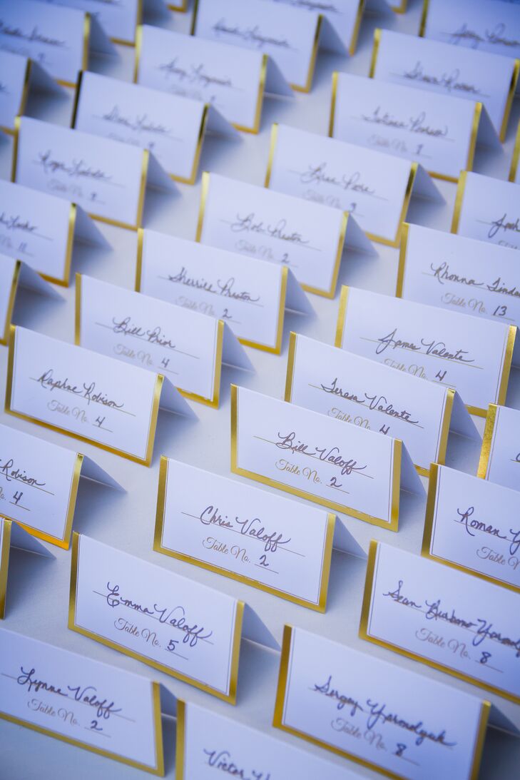 Once guests arrived for the reception at Catta Verdera Country Club in Lincoln, California, they found their seats by locating their simple white escort card bordered with gold.