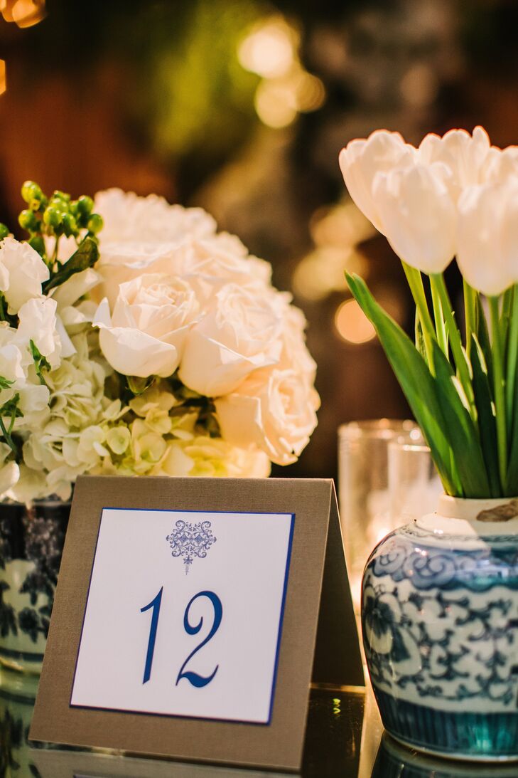The navy and cream design motif inspired by Chinoiserie vases was also utilized for the table numbers.