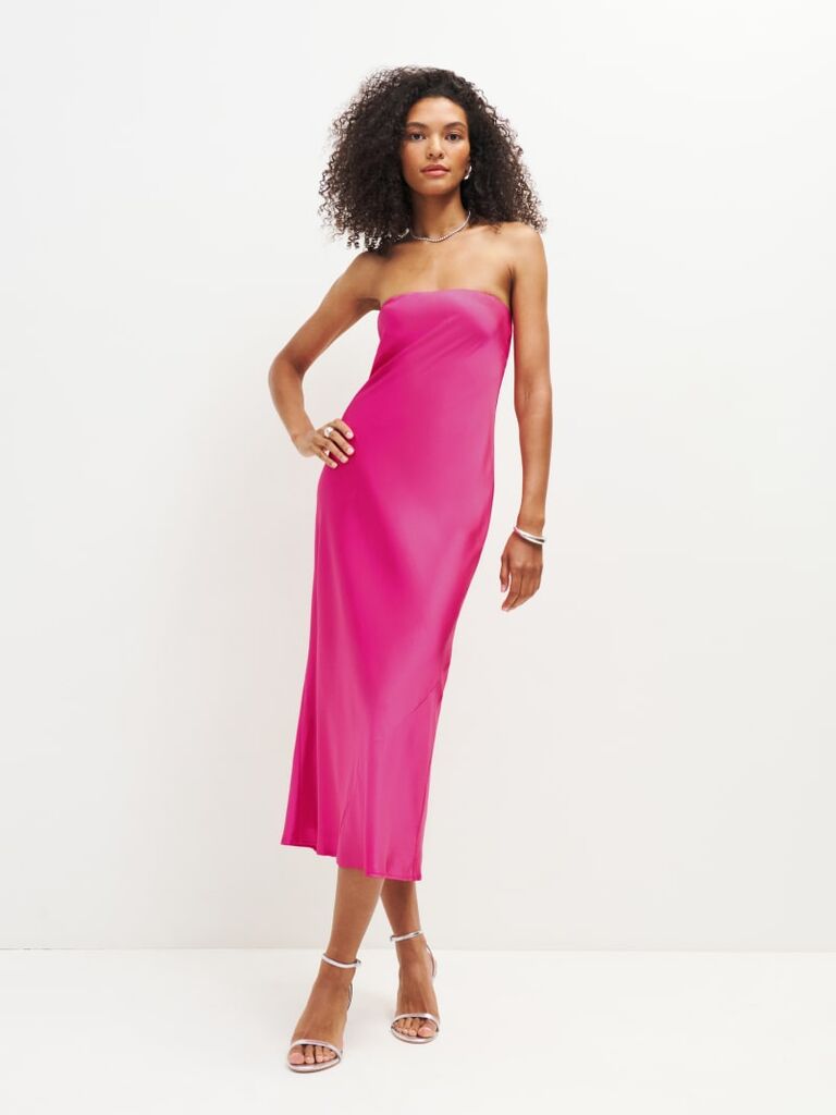 Pink strapless wedding guest cocktail dress from Reformation