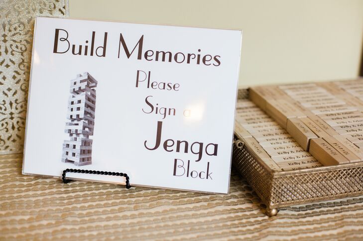 A fun alternative to the traditional guest book, the couple asked their guests to sign Jenga blocks that were laser cut with their wedding date.