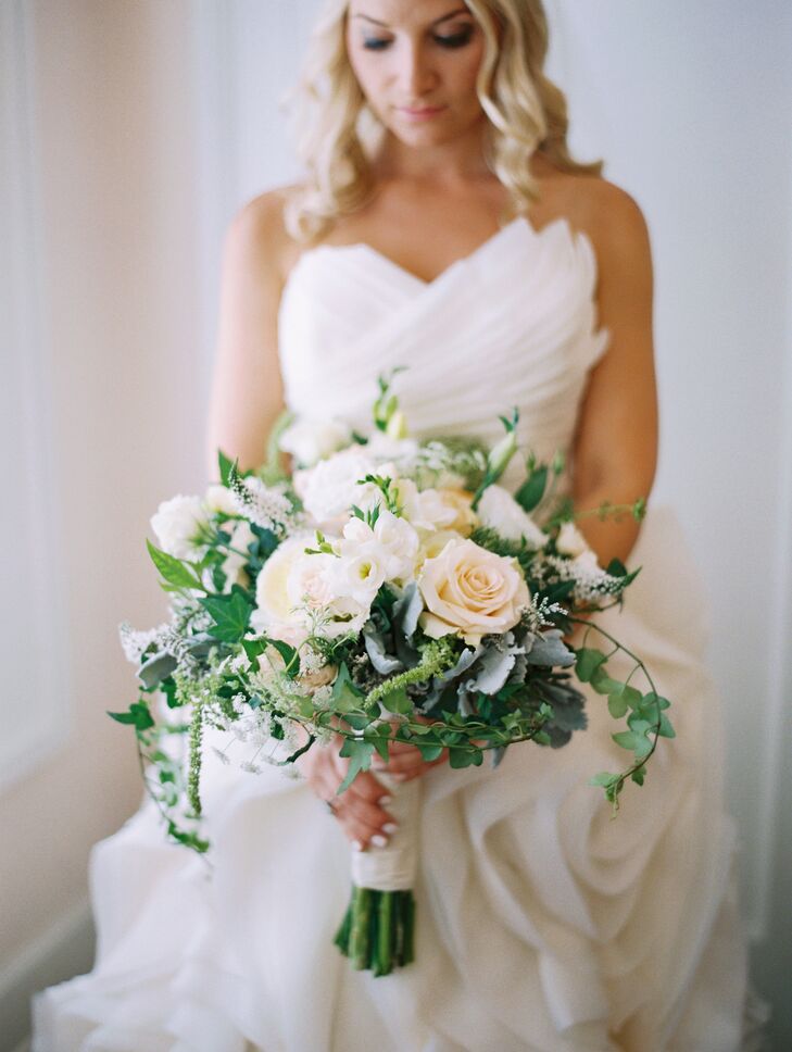“Our bouquets were breathtaking,” says Jamie. “Every arrangement was so well thought out and had the perfect amount of greenery and roses.” David Austin roses, freesias, veronica, dusty miller and ivy added to the romantic style.