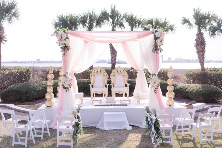 Mandap With Blush Draping Along Waterfront in Charleston, South Carolina