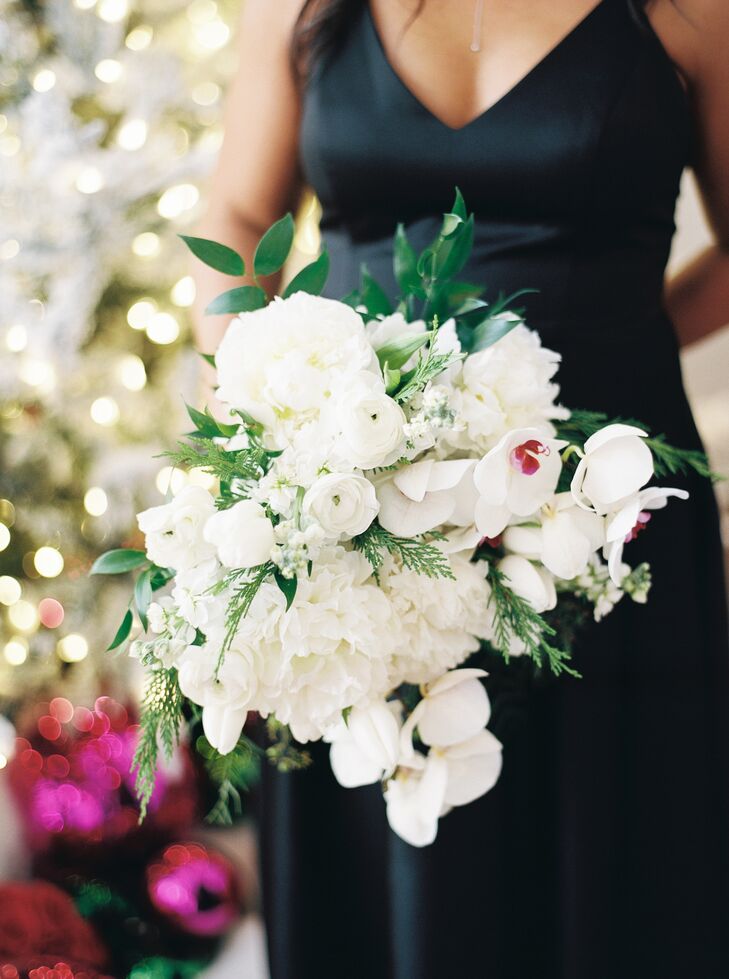 Bouquet With White Flowers Including Garden Roses, Orchids and Cedar Greenery