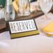 Gray and Yellow Reserved Paper Sign