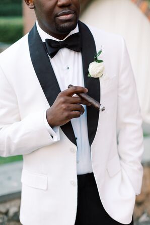 Man in Black-and-White Tuxedo With Cigar