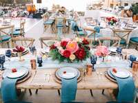Outdoor wedding reception with colorful table settings