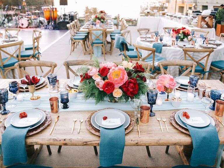 Outdoor wedding reception with colorful table settings