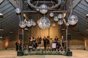 Live Reception Band in Barn Under Hanging Disco Balls