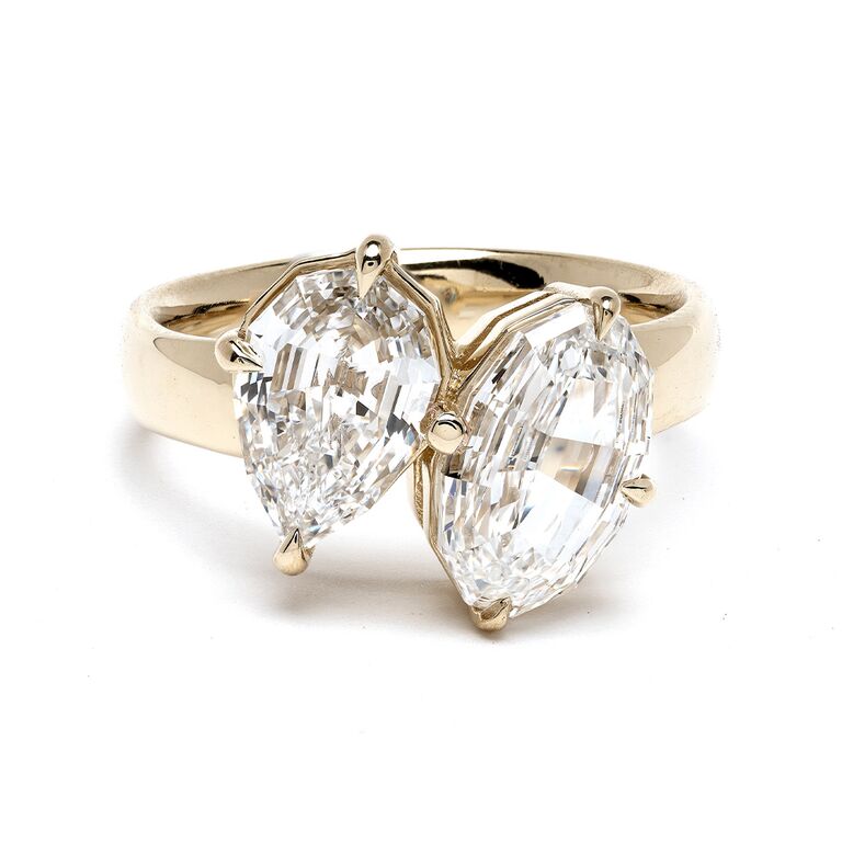 Oval and pear diamond yellow gold engagement ring