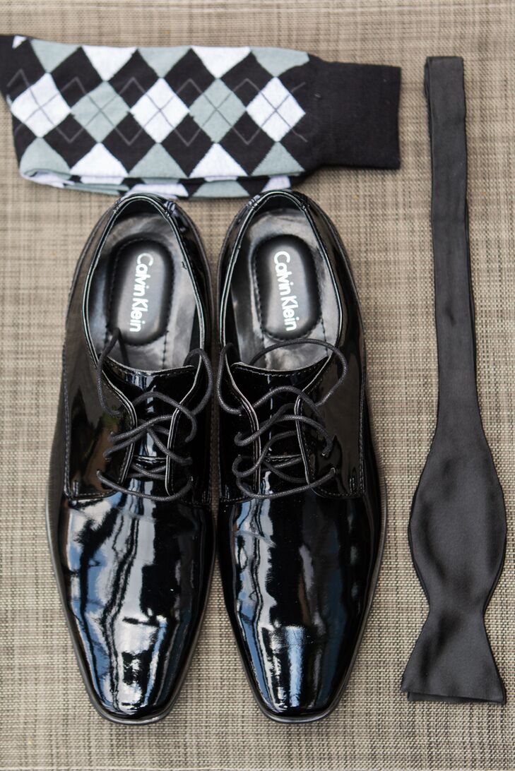 Tyler accessorized his Black by Vera Wang tuxedo with black patent shoes and a classic black bow tie.