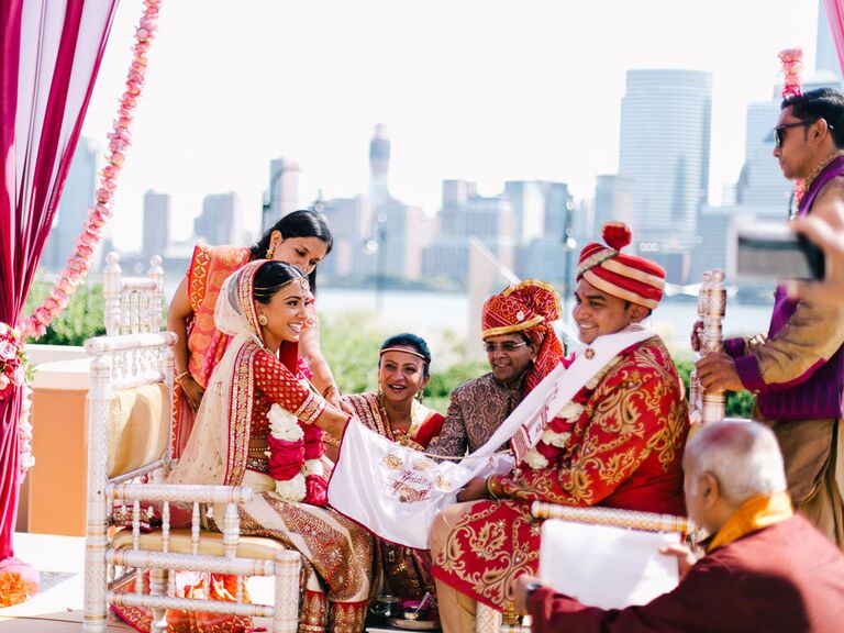 Bride and groom during Hindu Hasta Milap unity ceremony