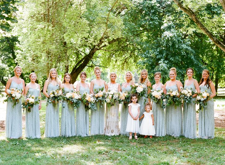 "I knew I wanted the dresses to go with the theme of the dress, and as soon as I saw the beadwork on them, I knew they were perfect," Lauren says of the Adrianna Papell gowns.