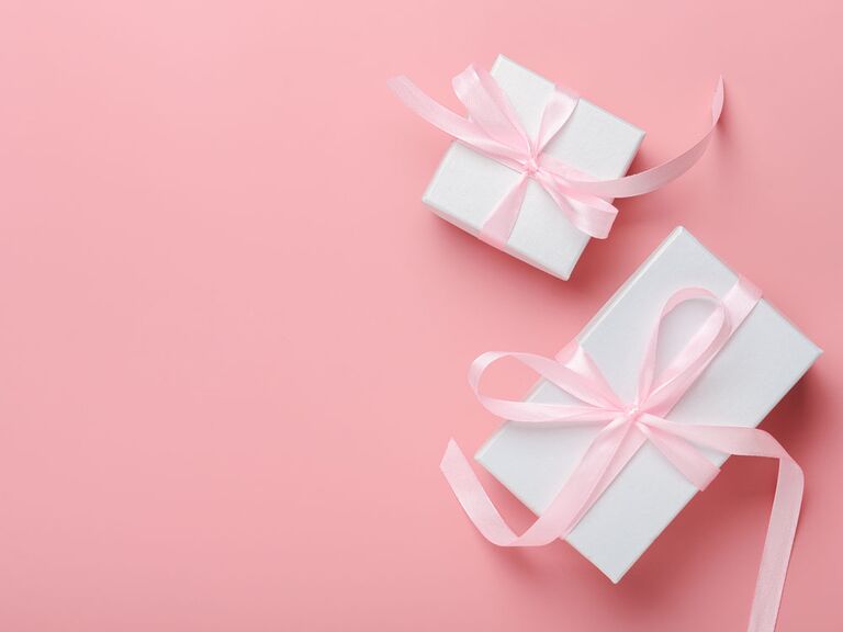 Wrapped bridal shower gift and wedding gift with pink bows