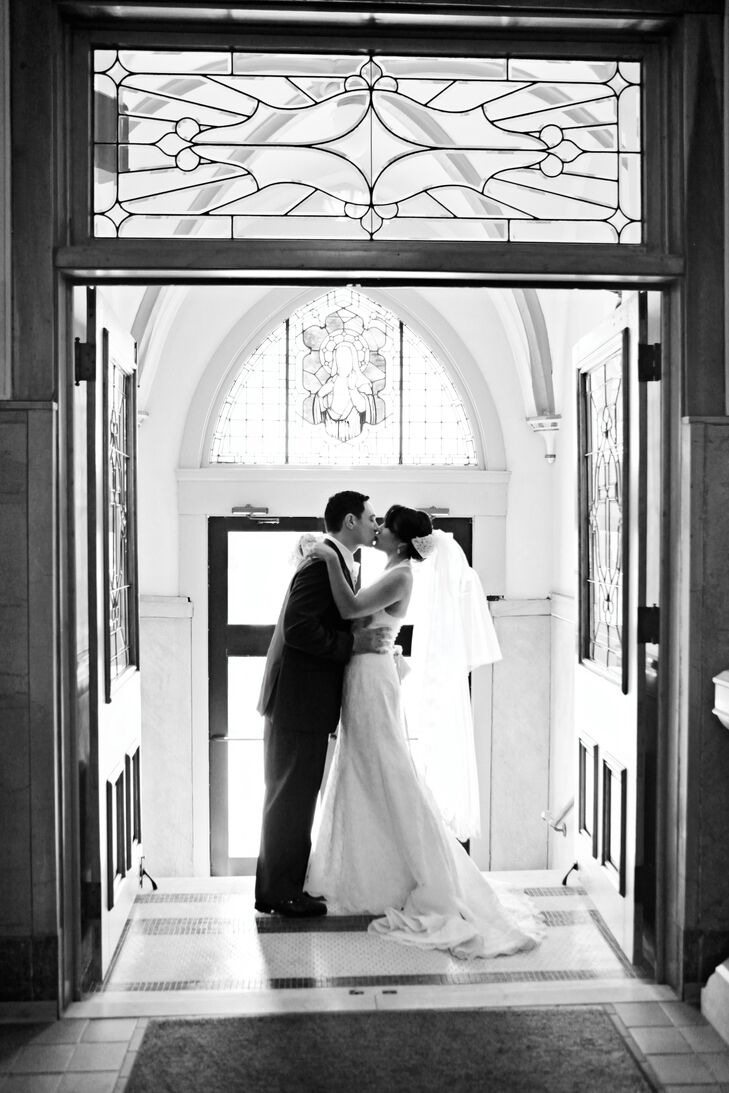 Andrea wore a romantic lace fit-and-flare gown. Patrick also chose a classic look with a charcoal-gray tuxedo.